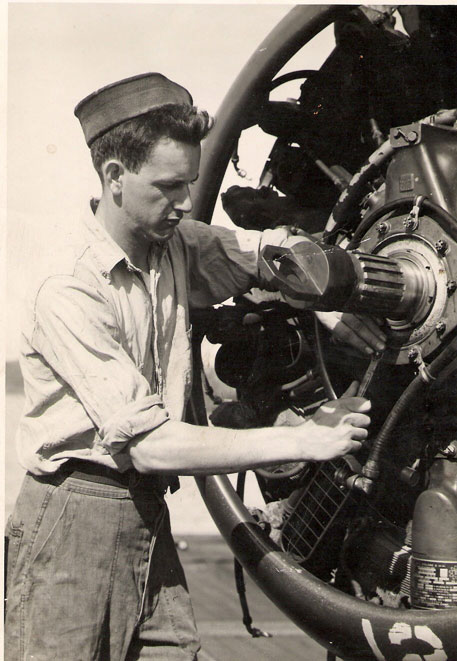 Harold Clark Adams Working on Plane